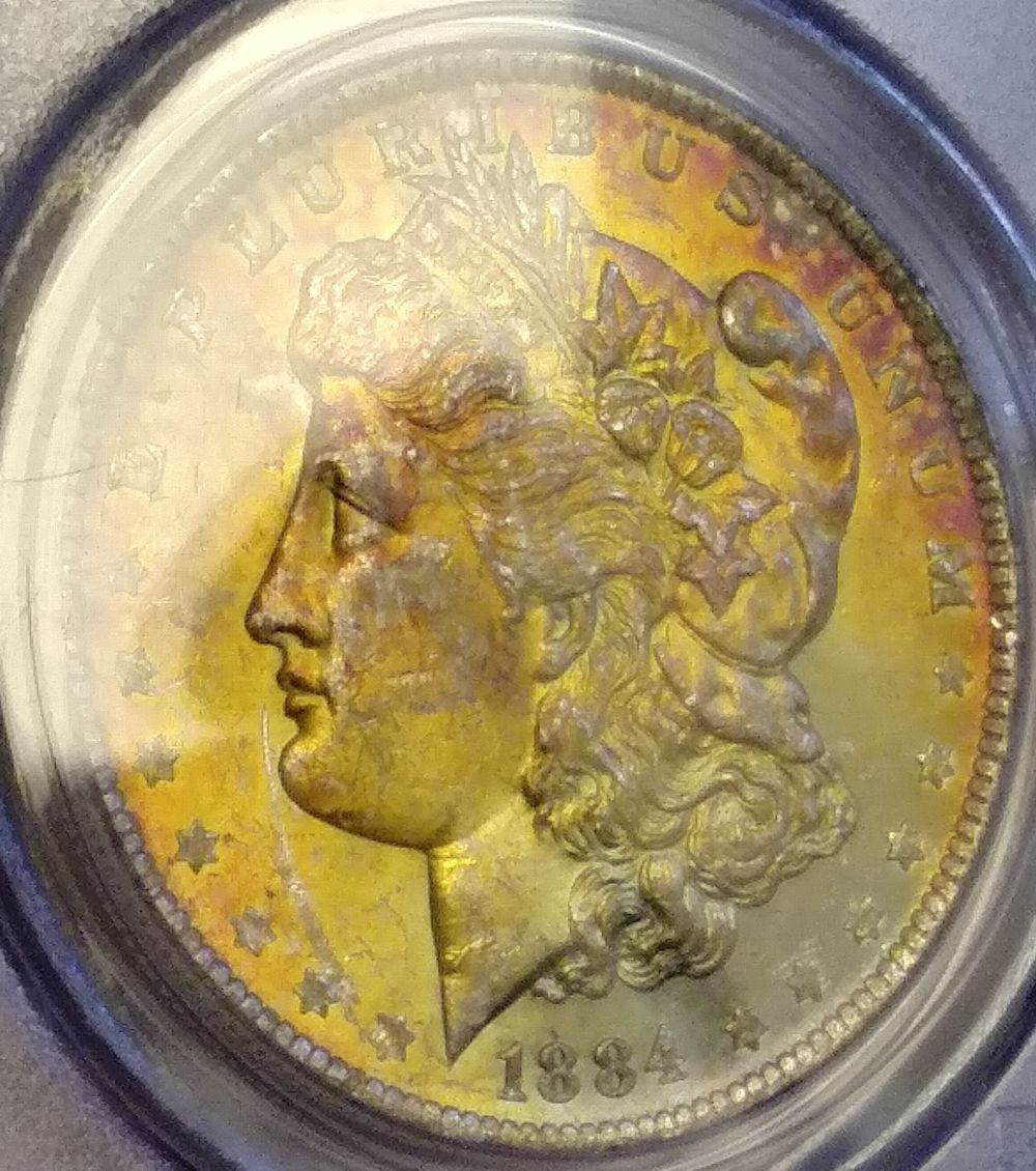 1884-O-Toned-Morgan-Dollar
